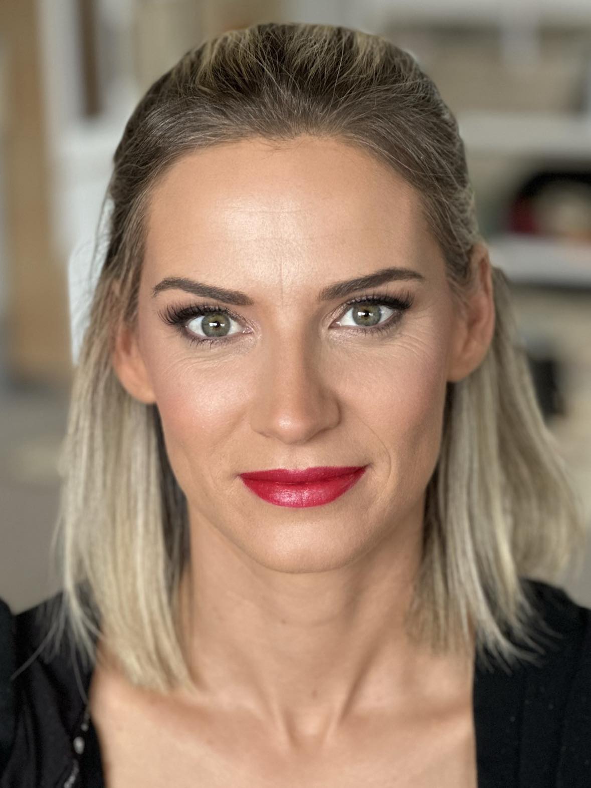 A diverse range of models of different ages showcasing beautiful, naturally glowing makeup. The models, including young adults, middle-aged individuals, and sen