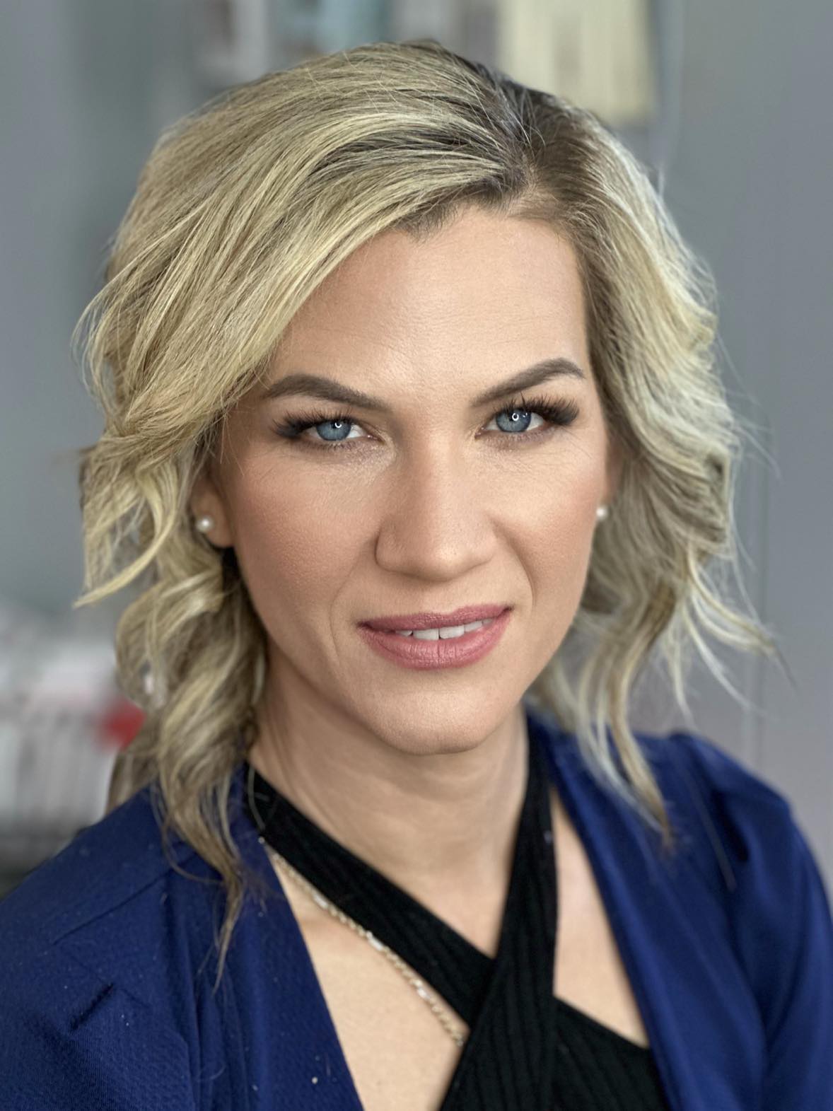 A diverse range of models of different ages showcasing beautiful, naturally glowing makeup. The models, including young adults, middle-aged individuals, and sen
